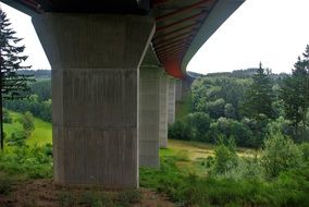 concrete pillars under Highway Bridge