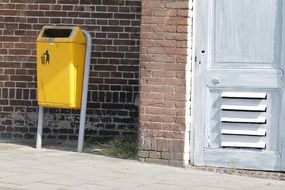 yellow litter bucket