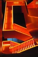 Futuristic illuminated red staircase