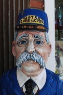 wooden figure of a train conductor in Virginia City