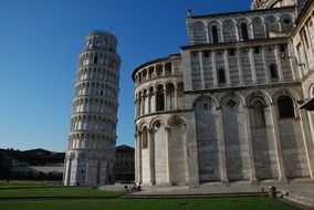 leaning tower near the building in pisa