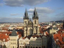 church among houses in prague