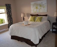 cozy hotel bedroom with a comfortable bed