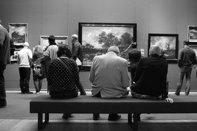 people in the hall in rijksmuseum in amsterdam