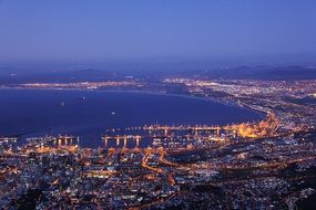 night coast with the colorful lights near the river