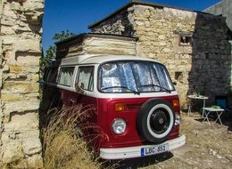 vintage minibus by the old house in Kato Drys