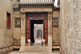 wooden doors to the courtyard