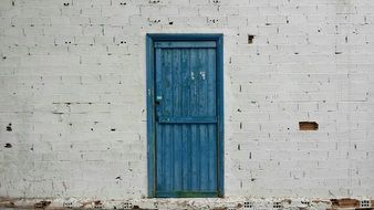 blue wooden doors in the building
