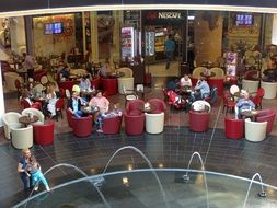 people in cafe in a shopping center in Bucharest