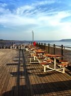 tables with chairs on the coast