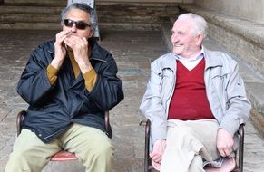Tuscans on the street are playing the harmonica
