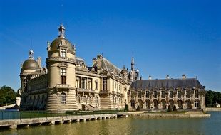 castle near a pond in france