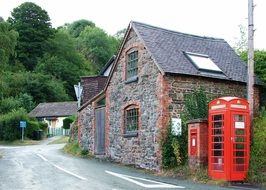 red telephone booth in the village of England