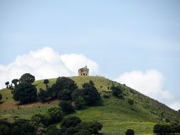 distant view of an old house on a hill