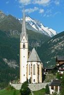 panoramic view of the Church of the Holy Blood in the mountains of austria