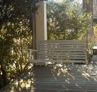 porch with a swing near the house