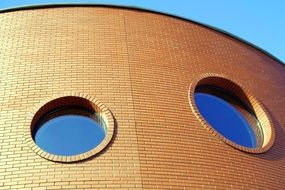 brick building with round windows