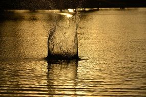 splash of water at sunset