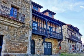 Historic Medieval Building with blue balconies