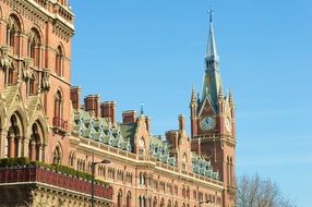 London Clock Building at blue sky and plants background