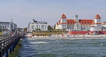 the beach, the bridge and white buildings