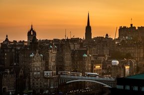 sunset over the city of edinburgh