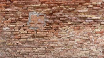 wall of broken bricks