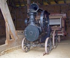 steam engine with trailer on farm