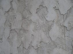 gray stucco on the wall close-up