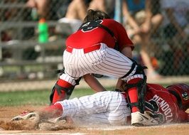 playing baseball players on a match