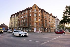 white car at the crossroads