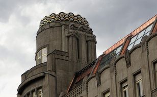 top of Koruna palace at cloudy sky, czech, Prague