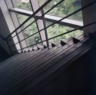 staircase with railing in a high-rise building