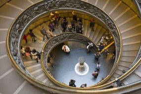 people on a spiral staircase