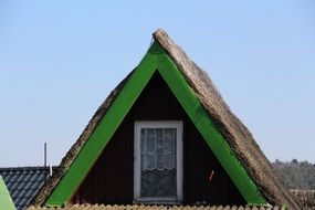 country house with a straw roof