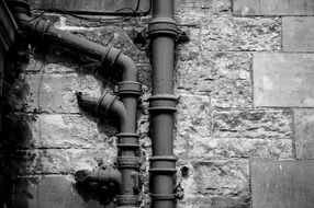 Pipe on a brick wall