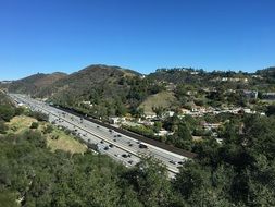 view from a hill on a highway in los angeles