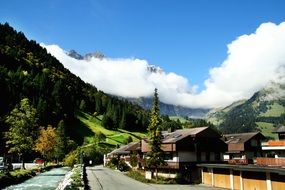 landscape of the village near green mountains