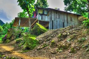 wooden Cottage in forest at mountain