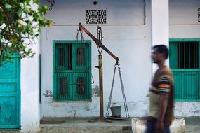 scales in motion on a street in india