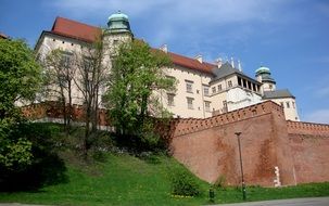 castle on a green hill in krakow