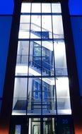 house with transparent windows near the stairs