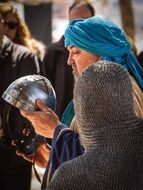 helmet in the hands of an arab man