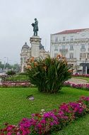 Statue and Flowers