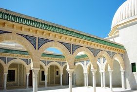 arched corridor with columns in the monastery