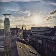 sunset over the rooftops in hamburg