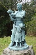 sculpture of a woman with children in a villa