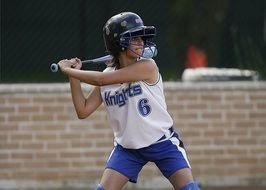 Teenager playing softball