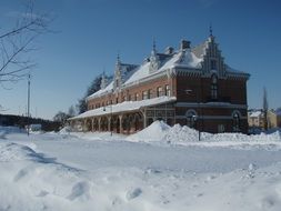 landscape of snowy Brick Building on a station