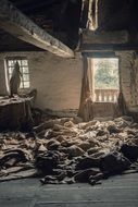 abandoned building with rags and garbage